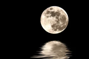 Moon reflecting over water