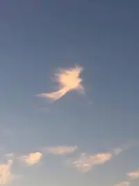 Cloud in the sky shaped like an angel