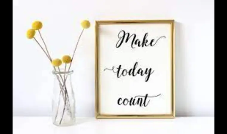 Sign that reads- make today count next to a vase for flowers