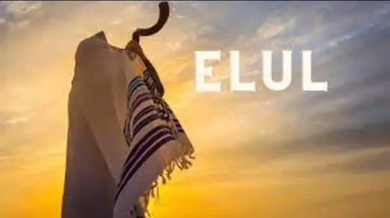Man blowing the shofar as sun is setting with ELUL written next to him