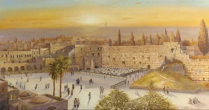 Kotel from a side view with the sun setting and people praying