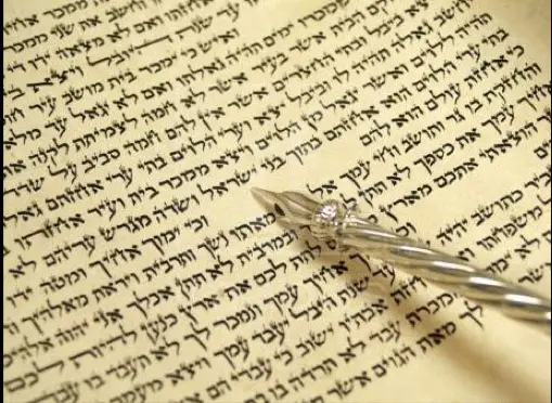 Yad on a Torah scroll