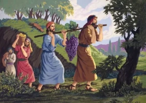 The spies carrying a giant thing of grapes on a stick