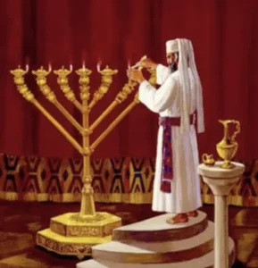 Kohen lighting the Menorah in the Beit Hamikdash