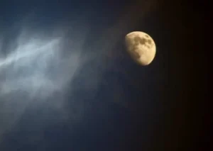 Full moon in the sky with wind blowing