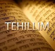 Open book of Tehillim with the word Tehillim written across it