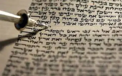 Yad on a Torah scroll