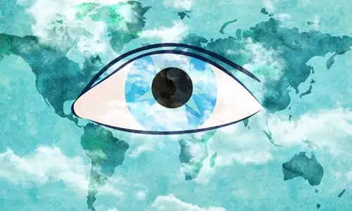 A blue eye surrounded by the world