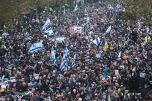 Group of Jews united waving Israeli flags